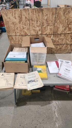 2 Boxes of assorted farm machinery manuals