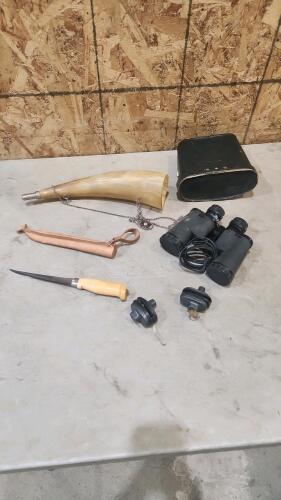 Filet knife, horn, binoculars, trigger locks